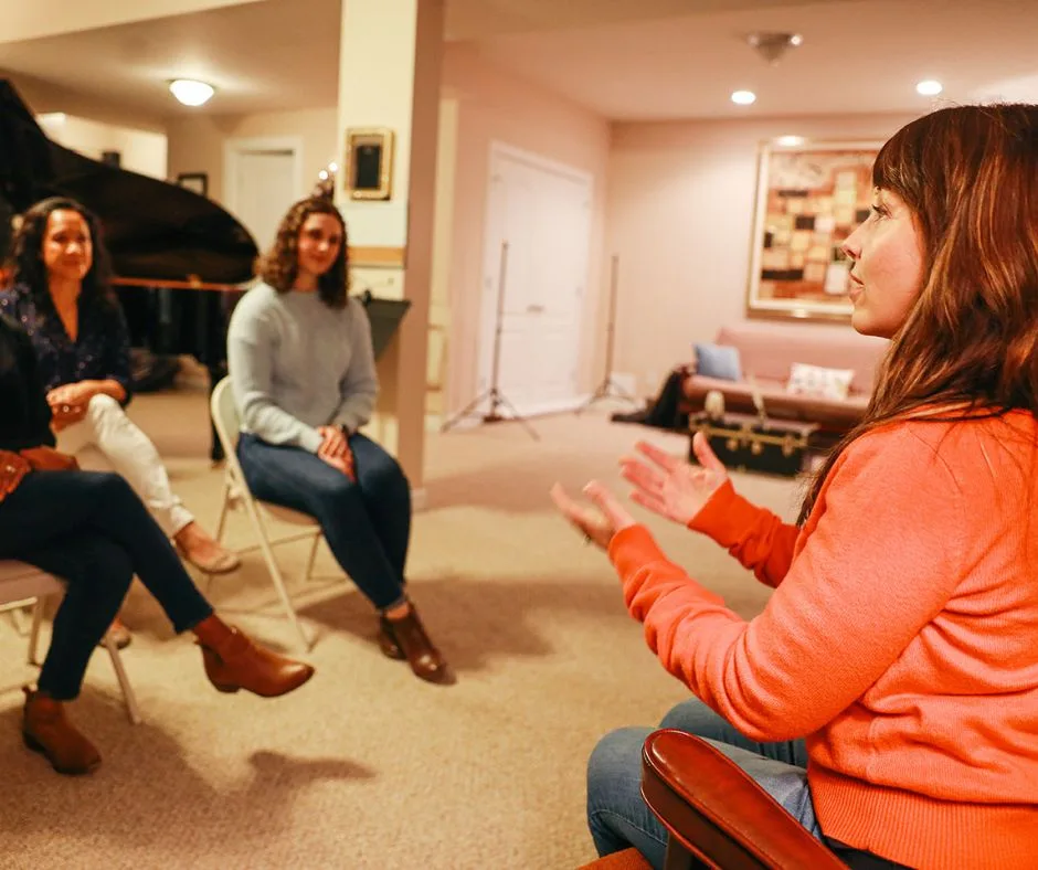 Meg teaching meditation to a group of people